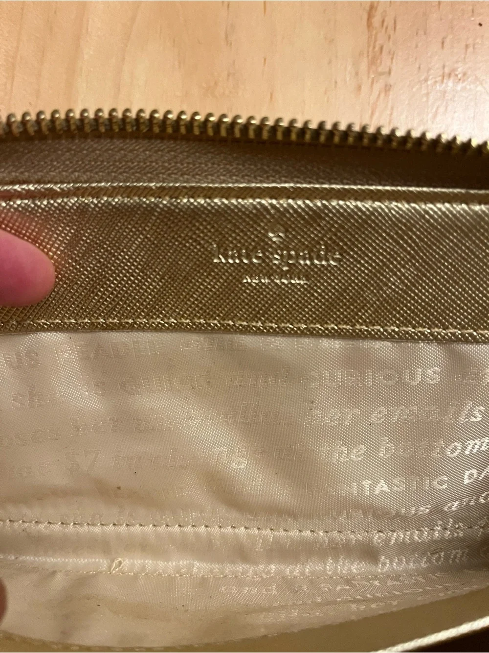 kate spade metallic gold textured zip wallet